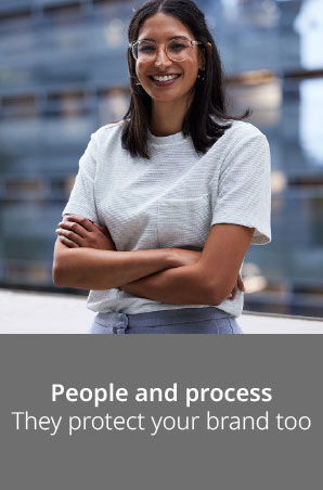 Smiling woman with arms crossed Smiling woman with arms crossed