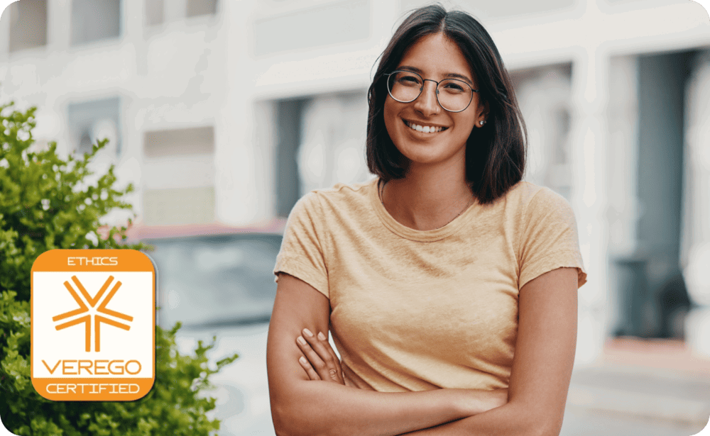 Young smiling woman with crossed arms  Young smiling woman with crossed arms